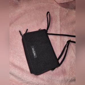 Vera Bradley black crossbody wallet.